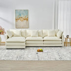 110.2 Canapé trois places capitonné en chenille, pouf