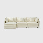 110.2 Canapé trois places capitonné en chenille, pouf
