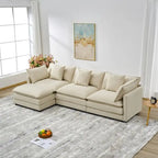 110.2 Canapé trois places capitonné en chenille, pouf