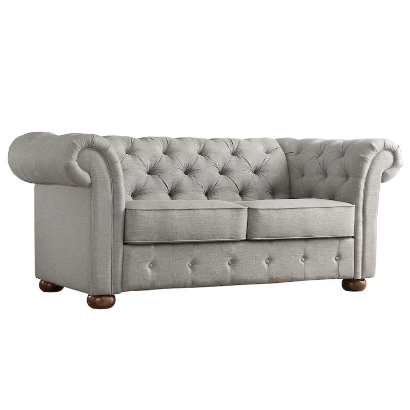 Causeuse Chesterfield à accoudoirs arrondis et capitonnée