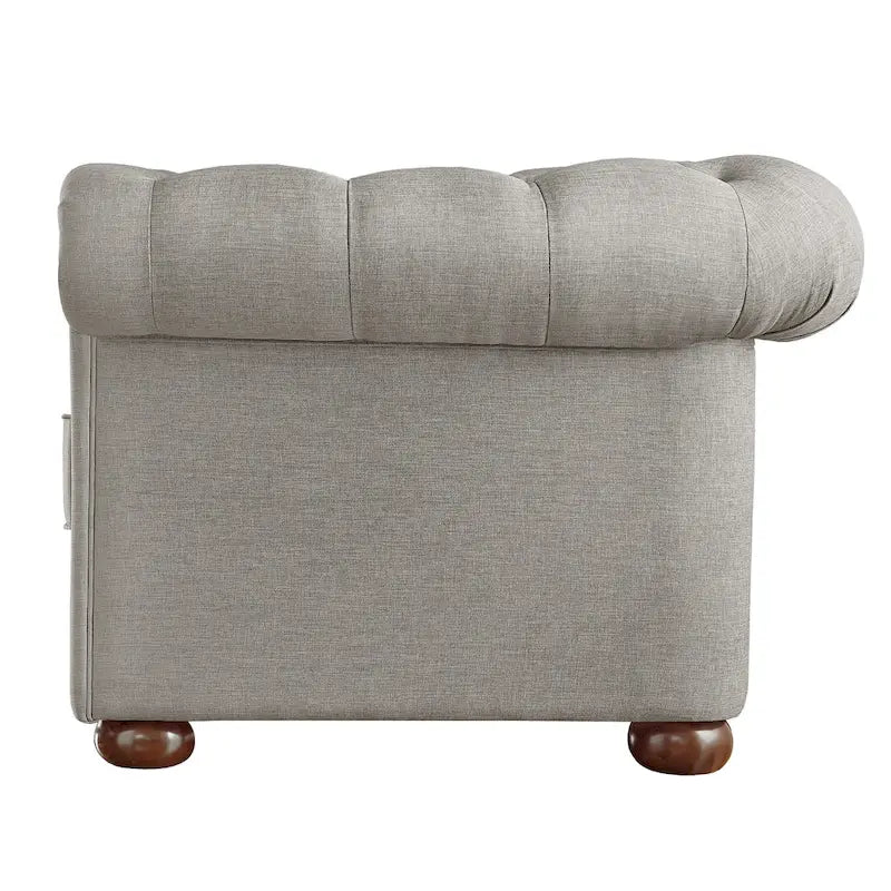 Causeuse Chesterfield à accoudoirs arrondis et capitonnée