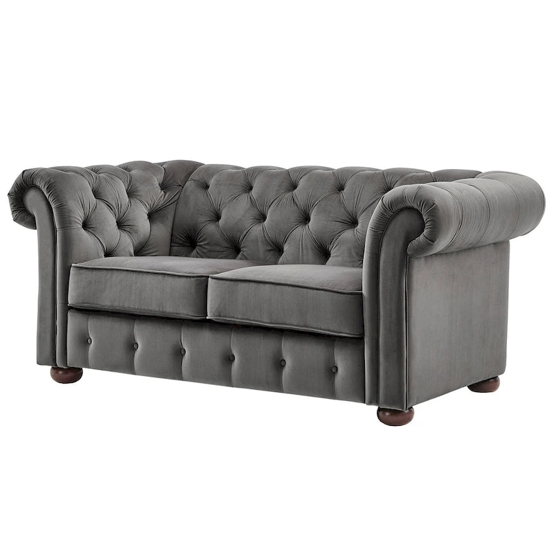 Causeuse Chesterfield à accoudoirs arrondis et capitonnée