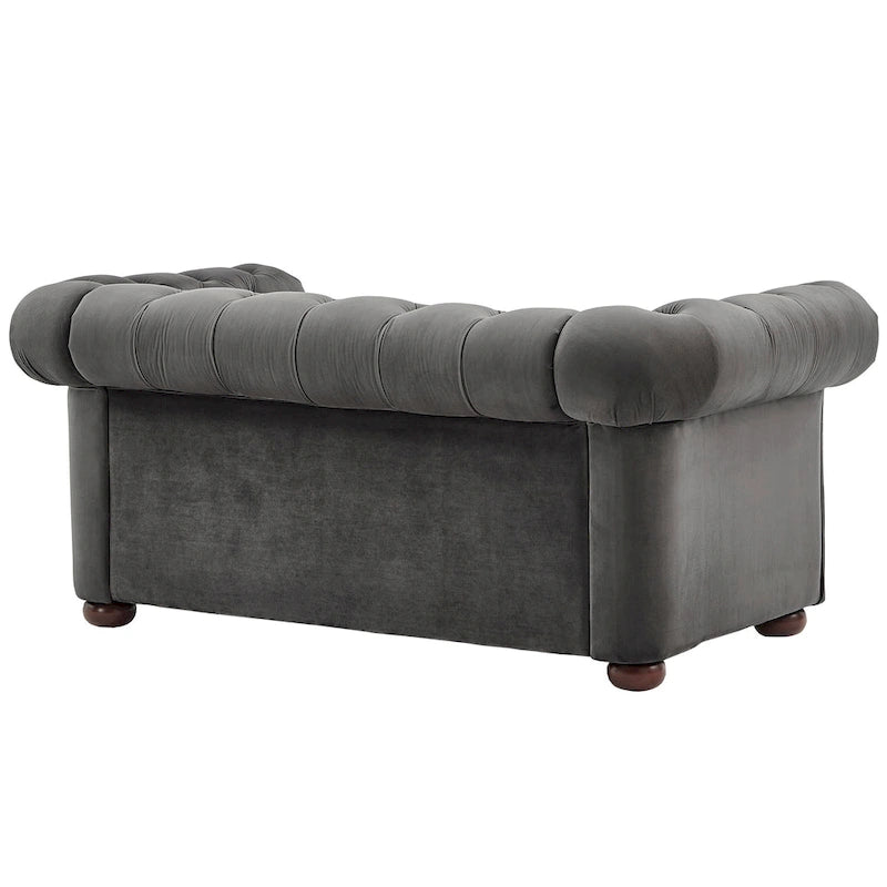 Causeuse Chesterfield à accoudoirs arrondis et capitonnée