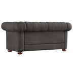 Causeuse Chesterfield à accoudoirs arrondis et capitonnée