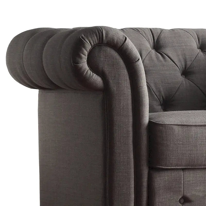 Causeuse Chesterfield à accoudoirs arrondis et capitonnée