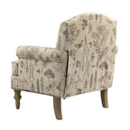 Fauteuil de ferme clouté avec accoudoirs roulés