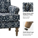 Fauteuil de ferme clouté avec accoudoirs roulés
